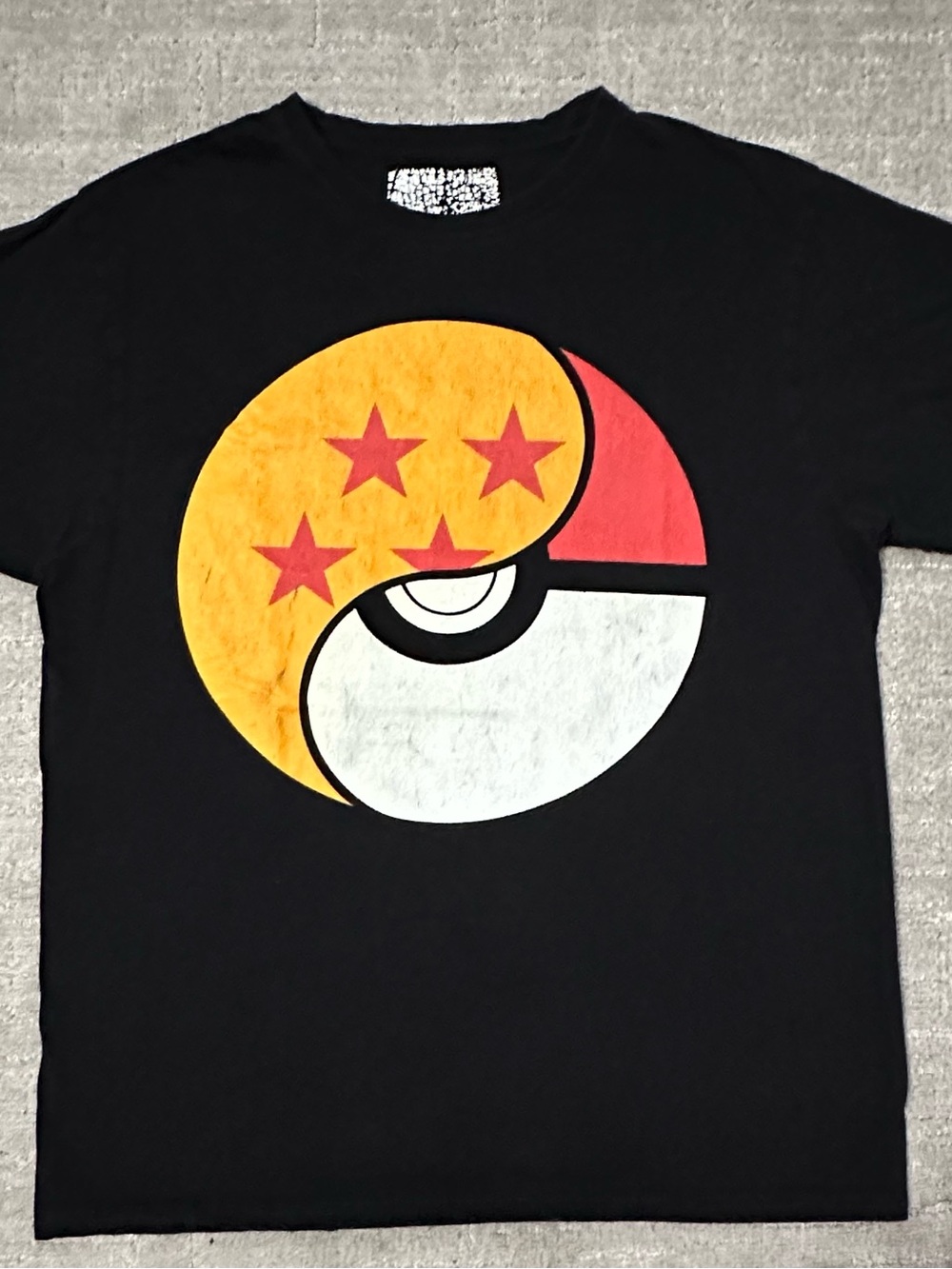 Black Graphic Tee with Yellow & Red Pokéball X dragon ball Z Inspired Emblem